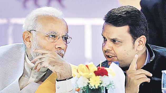 Prime minister Narendra Modi talks with Maharashtra CM Devendra Fadnavis during the opening ceremony of the Magnetic Maharashtra Convergence 2018 in Mumbai on Sunday. (PTI) Prime minister Narendra Modi talks with Maharashtra CM Devendra Fadnavis during the opening ceremony of the Magnetic Maharashtra Convergence 2018 in Mumbai on Sunday. (PTI)