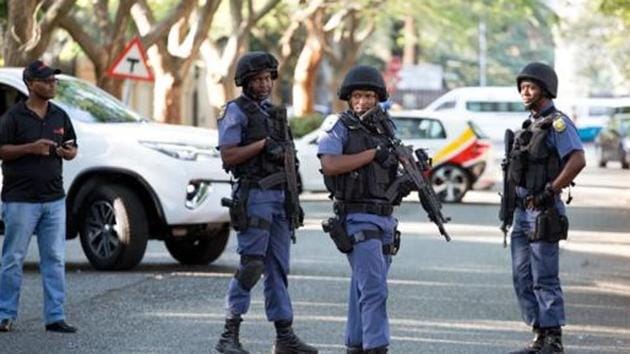 Police close off roads around the home of the Gupta family, friends of Jacob Zuma, in Johannesburg, South Africa, on February 14. (Reuters File Photo) Police close off roads around the home of the Gupta family, friends of Jacob Zuma, in Johannesburg, South Africa, on February 14. (Reuters File Photo)