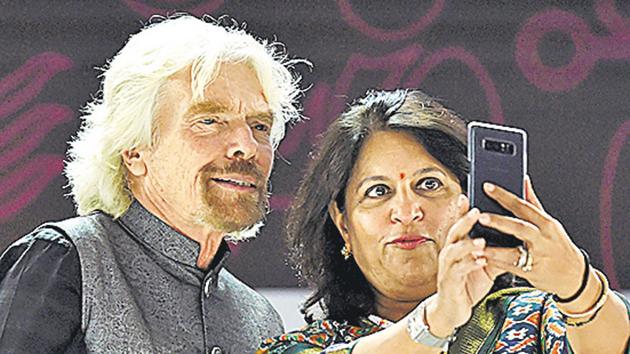 Mumbai CII president Shobana Kamineni takes a selfie with Virgin group founder Richard Branson during the opening ceremony of the Magnetic Maharashtra Convergence 2018 in Mumbai on Sunday. (PTI) Mumbai CII president Shobana Kamineni takes a selfie with Virgin group founder Richard Branson during the opening ceremony of the Magnetic Maharashtra Convergence 2018 in Mumbai on Sunday. (PTI)