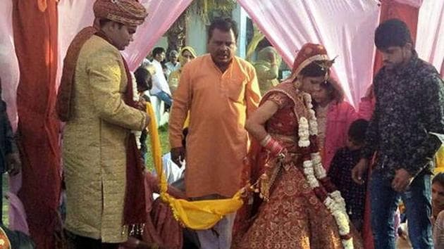 The two marriage ceremonies taking place at the banquet hall situated on Rohtak road.(HT Photo)