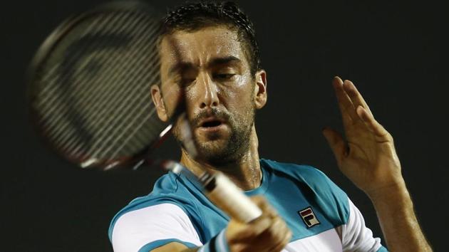 Marin Cilic in action against Carlos Berlocq during their Rio Open first round match on Monday. (AP) Marin Cilic in action against Carlos Berlocq during their Rio Open first round match on Monday. (AP)