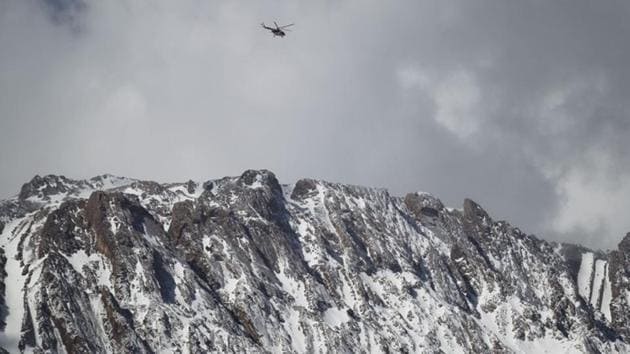 A rescue helicopter searches for the crashed aircraft. Iran has suffered multiple aviation disasters, most recently in 2014 when 39 people were killed as a Sepahan Airlines plane crashed just after take-off. (Tasnim News Agency / REUTERS) 