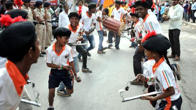 Children perform with laziums on the occasion of Shiv Jayanti celebrations at Bhavani peth on February 19. (HT Photo) Children perform with laziums on the occasion of Shiv Jayanti celebrations at Bhavani peth on February 19. (HT Photo)