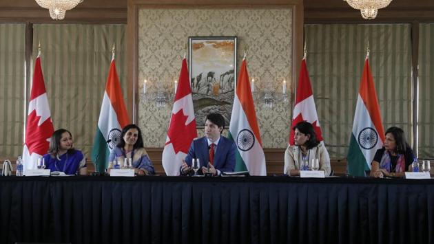 Canadian Prime Minister Justin Trudeau (C) speaks during the women business leaders' roundtable in Mumbai. (Danish Siddiqui / AP)