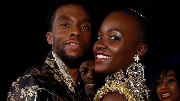 Cast members Chadwick Boseman and Lupita Nyong'o pose at the premiere of Black Panther in Los Angeles, California.(REUTERS)