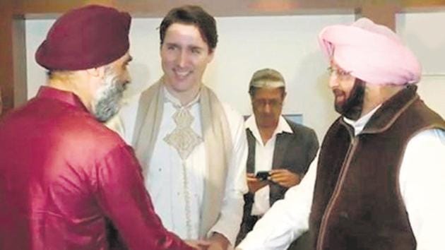 Punjab CM Amarinder Singh shaking hands with Canadian PM Justin Trudeau and defence minister Harjit Singh Sajjan during their visit to Amritsar on Wednesday. (ANI) Punjab CM Amarinder Singh shaking hands with Canadian PM Justin Trudeau and defence minister Harjit Singh Sajjan during their visit to Amritsar on Wednesday. (ANI)