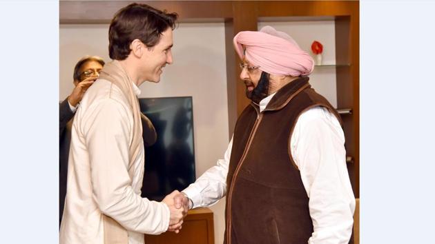 Justin Trudeau shakes hand with Punjab chief minister Captain Amarinder Singh as they meet at a hotel in Amritsar on Wednesday. (HT Photo) Justin Trudeau shakes hand with Punjab chief minister Captain Amarinder Singh as they meet at a hotel in Amritsar on Wednesday. (HT Photo)