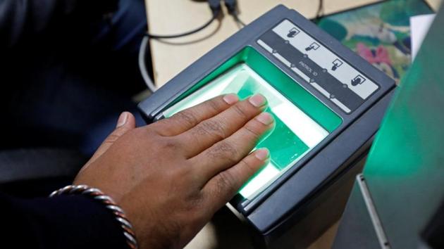 A woman goes through the process of finger scanning for the Unique Identification (UID) database system, at a registration centre in New Delhi.(Reuters File Photo)