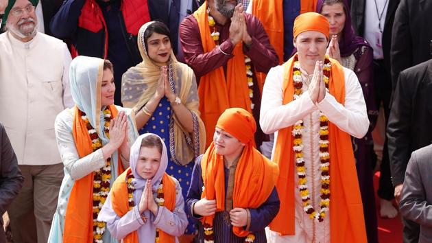 Canadian Prime Minister Justin Trudeau with his wife Sophie Gregoire, daughter Ella Grace and son Xavier, greet the people during their visit to the holy Sikh shrine of Golden Temple in Amritsar. (REUTERS/Adnan Abidi) Canadian Prime Minister Justin Trudeau with his wife Sophie Gregoire, daughter Ella Grace and son Xavier, greet the people during their visit to the holy Sikh shrine of Golden Temple in Amritsar. (REUTERS/Adnan Abidi)