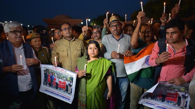 Manisha Saxena, Secretary Revenue and Division Commission along with Members of Delhi IAS officers association during a protest at Rajghat. AAP legislator Amanatullah Khan surrendered on Wednesday in connection with an alleged assault on Delhi’s chief secretary that has spiked tension between Arvind Kejriwal’s government and the city’s bureaucracy. Late Tuesday, police arrested Prakash Jarwal, the party legislator from Deoli. (Sanchit Khanna / HT Photo) Manisha Saxena, Secretary Revenue and Division Commission along with Members of Delhi IAS officers association during a protest at Rajghat. AAP legislator Amanatullah Khan surrendered on Wednesday in connection with an alleged assault on Delhi’s chief secretary that has spiked tension between Arvind Kejriwal’s government and the city’s bureaucracy. Late Tuesday, police arrested Prakash Jarwal, the party legislator from Deoli. (Sanchit Khanna / HT Photo)