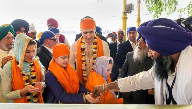 Canadian Prime Minister Justin Trudeau along with his family members receive karah prasad at Golden Temple in Amritsar on Wednesday. (PTI) Canadian Prime Minister Justin Trudeau along with his family members receive karah prasad at Golden Temple in Amritsar on Wednesday. (PTI)