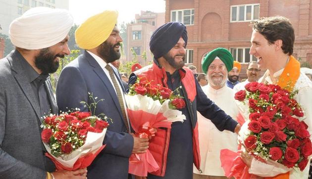 Canadian Prime Minister Justin Trudeau being welcomed by Union minister Hardeep Singh Puri (2R), Punjab cabinet minister Navjot Singh Sidhu (2L), MP Gurjeet Singh Aujla (2L) and Amritsar Mayor Karamjit Singh Rintu (L) during his visit to Partition Museum at town hall in Amritsar on Wednesday. (HT Photo) Canadian Prime Minister Justin Trudeau being welcomed by Union minister Hardeep Singh Puri (2R), Punjab cabinet minister Navjot Singh Sidhu (2L), MP Gurjeet Singh Aujla (2L) and Amritsar Mayor Karamjit Singh Rintu (L) during his visit to Partition Museum at town hall in Amritsar on Wednesday. (HT Photo)