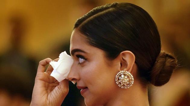 Deepika Padukone gets emotional during presentation of BAI's Lifetime Achievement Award to her father Prakash Padukone at a function in New Delhi. (PTI) Deepika Padukone gets emotional during presentation of BAI's Lifetime Achievement Award to her father Prakash Padukone at a function in New Delhi. (PTI)