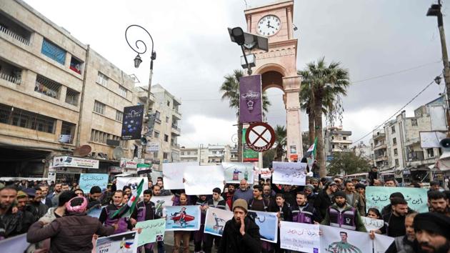 Syrians gather in solidarity in the rebel-held enclave of Eastern Ghouta during a demonstration in Idlib against the government bombardments. As per monitoring group, SOHR-- the death toll was likely to increase and the highest since the alleged chemical attack in the same region in 2013, which activists say claimed around 1,400 lives. (Omar Haj Kadour / AFP)