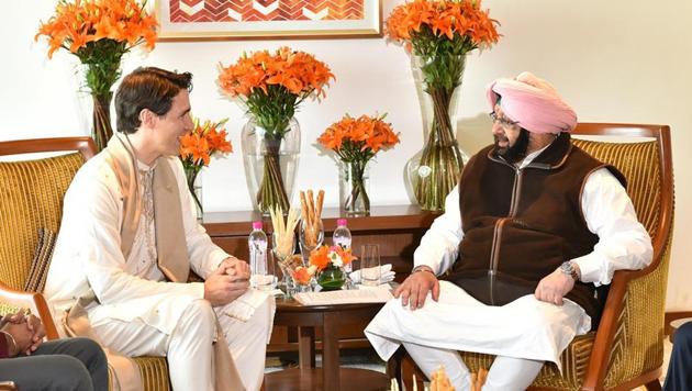 Canadian prime minister Justin Trudeau with Punjab chief minister Amarinder Singh at a hotel in Amritsar on Wednesday.(HT Photo)