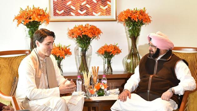 Justin Trudeau, along with his defence minister Harjit Sajjan on Wednesday met Punjab CM Captain Amarinder Singh. The meeting, which began with a handshake, lasted for a little over half an hour. Amarinder had earlier refused to meet Trudeau, claiming the Canadian Prime Minister’s cabinet members supported the formation of Khalistan. (HT Photo) Justin Trudeau, along with his defence minister Harjit Sajjan on Wednesday met Punjab CM Captain Amarinder Singh. The meeting, which began with a handshake, lasted for a little over half an hour. Amarinder had earlier refused to meet Trudeau, claiming the Canadian Prime Minister’s cabinet members supported the formation of Khalistan. (HT Photo)