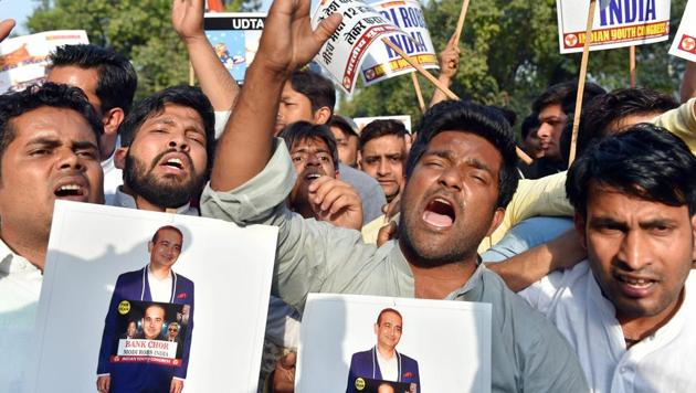 Youth Congress protest against Nirav Modi and the Punjab National Bank fraud case in New Delhi on Wednesday.(PTI Photo) Youth Congress protest against Nirav Modi and the Punjab National Bank fraud case in New Delhi on Wednesday.(PTI Photo)