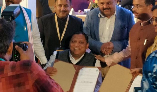 Atul Gupta, an investor from Meerut, signed an MoU for a five-star hotel that will come up in Amausi with investment of Rs 300 crore. (HT Photo) Atul Gupta, an investor from Meerut, signed an MoU for a five-star hotel that will come up in Amausi with investment of Rs 300 crore. (HT Photo)