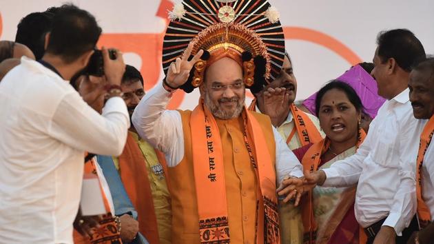 BJP president Amit Shah being felicitated at the fishermen's convention at Maple beach in Udupi, Karnataka, on February 20. (Arijit Sen / HT) BJP president Amit Shah being felicitated at the fishermen's convention at Maple beach in Udupi, Karnataka, on February 20. (Arijit Sen / HT)