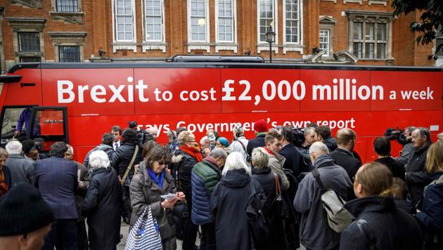Campaigners and media gather as the Brexit Facts Bus, rolled out by European Union advocates as they kick off a new initiative against Brexit, is launched at College Green in central London on Wednesday. (AFP Photo) Campaigners and media gather as the Brexit Facts Bus, rolled out by European Union advocates as they kick off a new initiative against Brexit, is launched at College Green in central London on Wednesday. (AFP Photo)