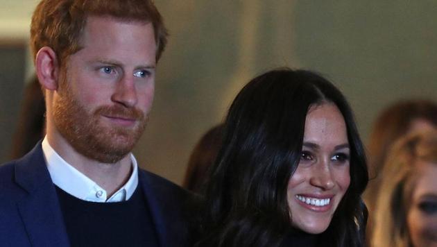 Britain's Prince Harry and his fiancée US actress Meghan Markle attend a reception for young people in the Palace of Holyroodhouse in Edinburgh, during their visit to Scotland on February 13. (AFP file) Britain's Prince Harry and his fiancée US actress Meghan Markle attend a reception for young people in the Palace of Holyroodhouse in Edinburgh, during their visit to Scotland on February 13. (AFP file)