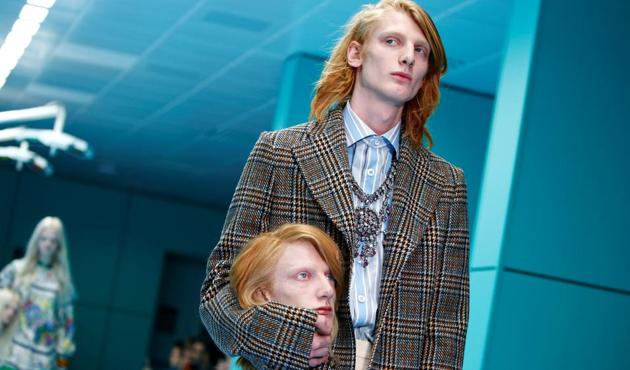 Gucci kicked off Milan Fashion Week in an eccentric style as models carried severed replicas of their own heads on a runway transformed into a creepy operating room. The show began with a moment’s pause to put focus on women who have come forward as victims of sexual misconduct. (Tony Gentile / REUTERS)