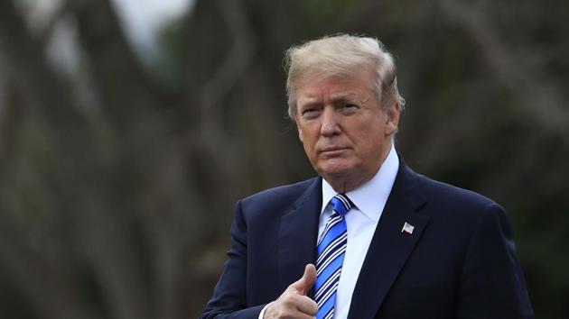 President Donald Trump gestures as he walks as he leaves the White House in Washington. The Trump administration is considering new sanctions against Russia in response to election meddling and a devastating cyber attack last year. (AP File Photo) President Donald Trump gestures as he walks as he leaves the White House in Washington. The Trump administration is considering new sanctions against Russia in response to election meddling and a devastating cyber attack last year. (AP File Photo)