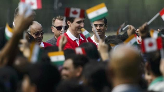 Canadian Prime Minister Justin Trudeau ( centre) greets students at the Modern School in Delhi.(AP) Canadian Prime Minister Justin Trudeau ( centre) greets students at the Modern School in Delhi.(AP)
