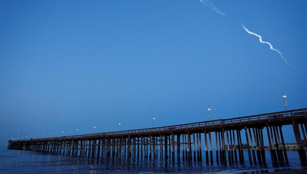 The SpaceX Falcon 9 rocket carrying a PAZ Earth Observation satellite is launched from Vandenberg Air Force Base (AFB) as seen over the Ventura Pier in Ventura, California.(Reuters Photo)