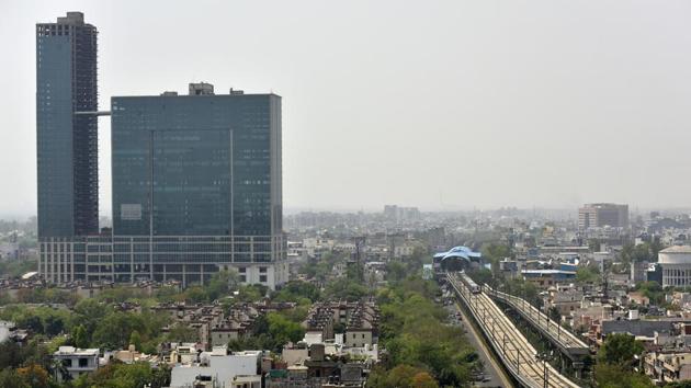 Ariel view of Noida city from Sector-18 in Noida. Many housing projects in Noida, Greater Noida and Yamuna Expressway areas are stuck as builders have cited financial hardship.(Virendra Singh Gosain/HT PHOTO)