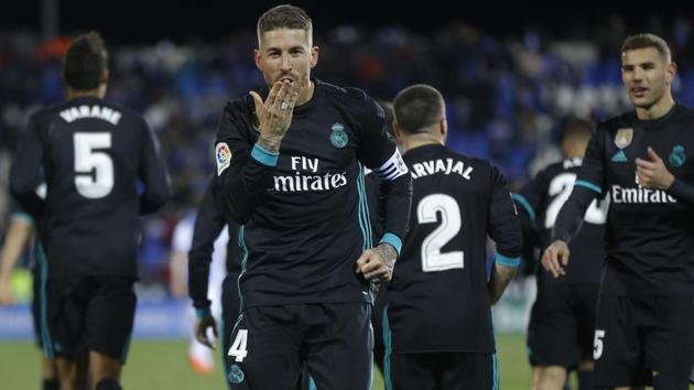 Sergio Ramos blows a kiss as he celebrates after scoring his side's third goal during a La Liga match between Real Madrid and Leganes at the Butarque stadium in Leganes, outside Madrid on February 21, 2018.(AP)