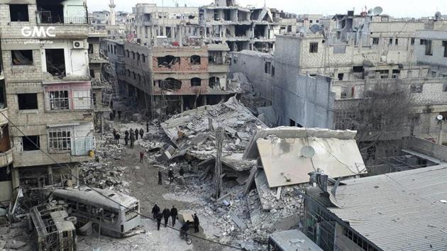 The buildings destroyed in the shelling by Syrian government forces, in Ghouta, a suburb of Damascus. (AP photo) The buildings destroyed in the shelling by Syrian government forces, in Ghouta, a suburb of Damascus. (AP photo)