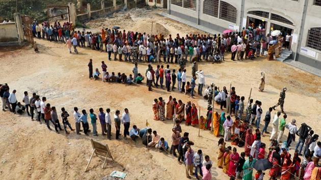 People stand in queues to cast their vote outside a polling station during Tripura state assembly election on the outskirts of Agartala. The Election Commission (EC) said on Friday that re-polling will be held in six polling booths across six assembly constituencies on February 26. (REUTERS File) People stand in queues to cast their vote outside a polling station during Tripura state assembly election on the outskirts of Agartala. The Election Commission (EC) said on Friday that re-polling will be held in six polling booths across six assembly constituencies on February 26. (REUTERS File)