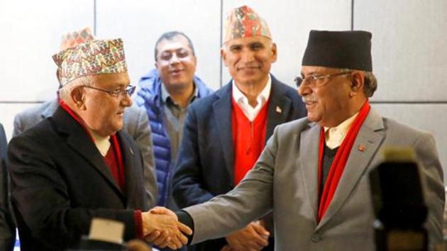 Chairman of Communist Party of Nepal (UML) KP Oli (left) greets Communist Party of Nepal (Maoist Centre) chairman Prachanda. The alliance has a very strong Chinese backing. (Reuters File Photo) Chairman of Communist Party of Nepal (UML) KP Oli (left) greets Communist Party of Nepal (Maoist Centre) chairman Prachanda. The alliance has a very strong Chinese backing. (Reuters File Photo)