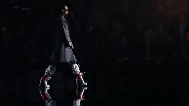 A model presents a creation from the Prada Autumn/Winter 2018 women collection during the Milan Fashion Week. (Alessandro Garofalo / REUTERS)