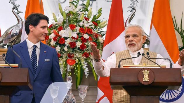 Prime Minister Narendra Modi speaks as his Canadian counterpart Justin Trudeau looks on, during a joint press conference at Hyderabad House in New Delhi on Friday. (PTI Photo) Prime Minister Narendra Modi speaks as his Canadian counterpart Justin Trudeau looks on, during a joint press conference at Hyderabad House in New Delhi on Friday. (PTI Photo)