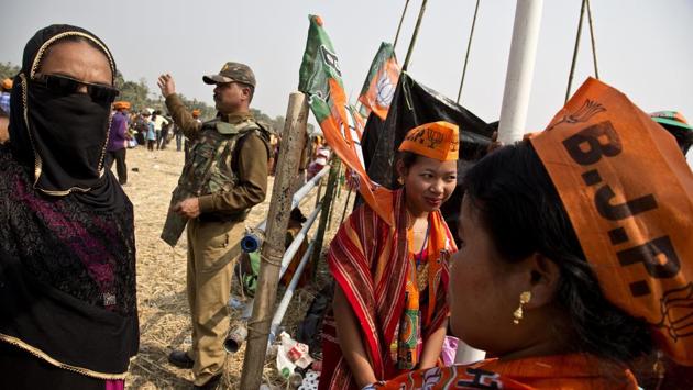 Supporters of Bharatiya Janata Party during an election rally in Phoolbari village in Garo Hills, Meghalaya on February 22. Meghalaya state assembly election is scheduled to be held on February 27. (Anupam Nath / AP)