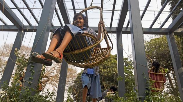 Visitors have some fun on the newly renovated swings at the park. (Shashi S Kashyap/HT) 