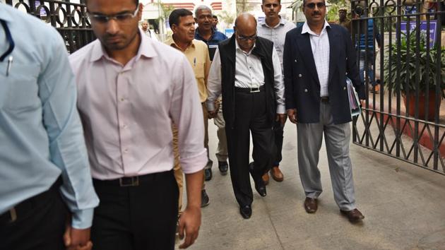 The CBI on Friday produced Rotomac owner Vikram Kothari and his son Rahul (front) before a Delhi court in connection with the Rs 3,695-crore loan default case and sought their transit remand to take them to Lucknow. (Sanchit Khanna / HT Photo) The CBI on Friday produced Rotomac owner Vikram Kothari and his son Rahul (front) before a Delhi court in connection with the Rs 3,695-crore loan default case and sought their transit remand to take them to Lucknow. (Sanchit Khanna / HT Photo)