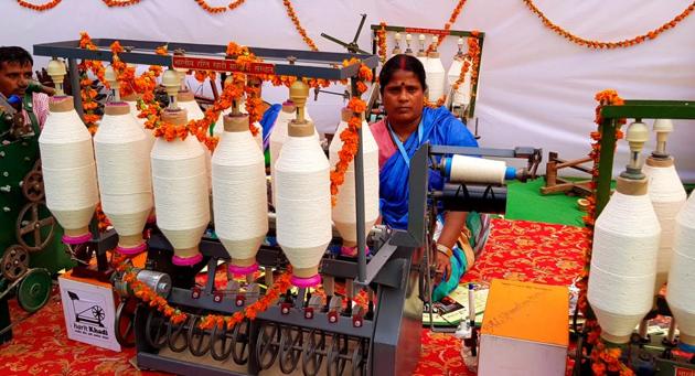 Put on display at UP Investors’ Summit, solar-powered smart charkhas are set to replace the traditional ones.(HT Photo)