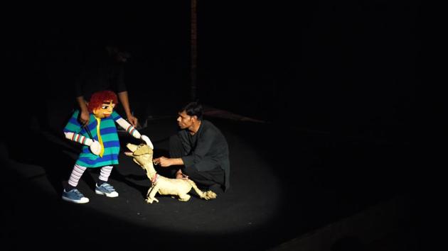 A puppet artist performs a heartwarming delightful musical tale, ‘Me and Baba’ to highlight the love, loyalty, hope, trust and bonding to discover why a dog is truly man’s best friend during the Ishara International Puppet Theatre Festival. (Sanchit Khanna / HT Photo ) A puppet artist performs a heartwarming delightful musical tale, ‘Me and Baba’ to highlight the love, loyalty, hope, trust and bonding to discover why a dog is truly man’s best friend during the Ishara International Puppet Theatre Festival. (Sanchit Khanna / HT Photo )