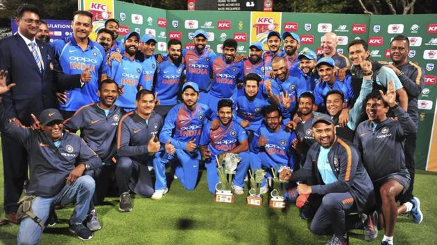 Indian cricket team pose with the trophy after beating South Africa in the third and final T20 in Cape Town on Saturday.(AP)