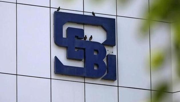 File photo of birds rest on the logo of the Securities and Exchange Board of India (SEBI) installed on the facade of its head office building in Mumbai. (Reuters) File photo of birds rest on the logo of the Securities and Exchange Board of India (SEBI) installed on the facade of its head office building in Mumbai. (Reuters)