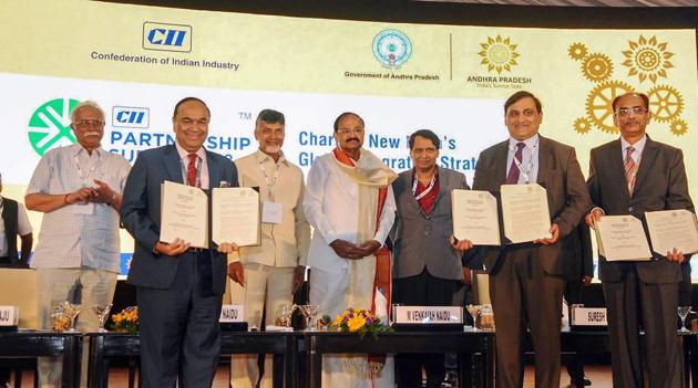 Vice president M Venkaiah Naidu witnesses the exchange of MoUs at the CII Partnership Summit 2018, in Vishakhapatnam on Saturday. Andhra Pradesh CM N Chandrababu Naidu and Union minister for commerce and industry Suresh Prabhakar Prabhu, among others, are also seen. (PTI) Vice president M Venkaiah Naidu witnesses the exchange of MoUs at the CII Partnership Summit 2018, in Vishakhapatnam on Saturday. Andhra Pradesh CM N Chandrababu Naidu and Union minister for commerce and industry Suresh Prabhakar Prabhu, among others, are also seen. (PTI)