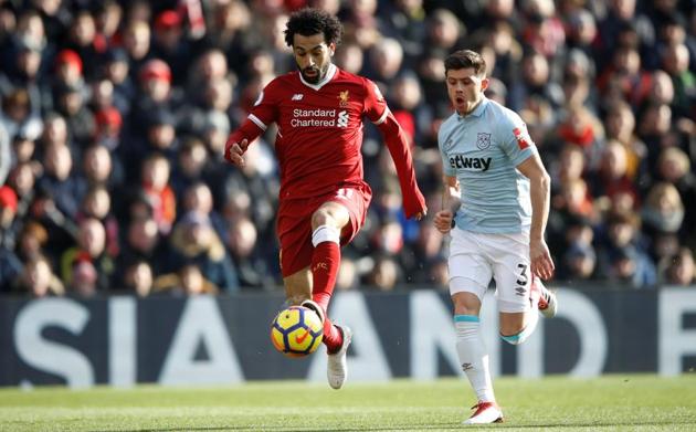 Liverpool's Mohamed Salah in action with West Ham United's Aaron Cresswell during their Premier League game at Anfield on Saturday. (Reuters) Liverpool's Mohamed Salah in action with West Ham United's Aaron Cresswell during their Premier League game at Anfield on Saturday. (Reuters)