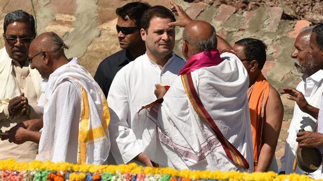Congress president Rahul Gandhi performs rituals during the celebration of the Chikkapadasalagi barrage being filled with water in Jamakhandi, Karnataka, on Sunday. (Arijit Sen/HT Photo) Congress president Rahul Gandhi performs rituals during the celebration of the Chikkapadasalagi barrage being filled with water in Jamakhandi, Karnataka, on Sunday. (Arijit Sen/HT Photo)