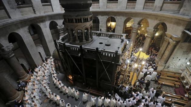 Members of the Catholic clergy hold candles during a procession at the traditional Washing of the Feet ceremony at the Church of the Holy Sepulchre in Jerusalem's Old City during Holy Week April 2, 2015. (REUTERS) Members of the Catholic clergy hold candles during a procession at the traditional Washing of the Feet ceremony at the Church of the Holy Sepulchre in Jerusalem's Old City during Holy Week April 2, 2015. (REUTERS)