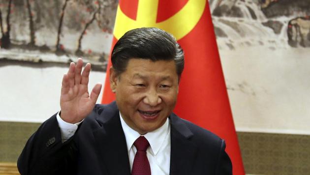 Chinese President Xi Jinping waves while addressing the media as he introduced new members of the Politburo Standing Committee at Beijing's Great Hall of the People. (AP File Photo) Chinese President Xi Jinping waves while addressing the media as he introduced new members of the Politburo Standing Committee at Beijing's Great Hall of the People. (AP File Photo)