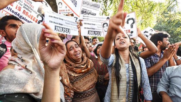 JNU students along with Najeeb’s family members protest outside CBI headquarters in New Delhi on Monday. 27-year-old Najeeb has been missing since October 14-15, 2016 after a scuffle at his JNU hostel allegedly with ABVP activists the previous night. The RSS students’ wing has denied any involvement in his disappearance. (Raj K Raj / HT Photo) JNU students along with Najeeb’s family members protest outside CBI headquarters in New Delhi on Monday. 27-year-old Najeeb has been missing since October 14-15, 2016 after a scuffle at his JNU hostel allegedly with ABVP activists the previous night. The RSS students’ wing has denied any involvement in his disappearance. (Raj K Raj / HT Photo)