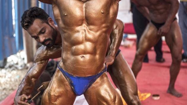 The competitors prep to look their best. (Satish Bate/HT)